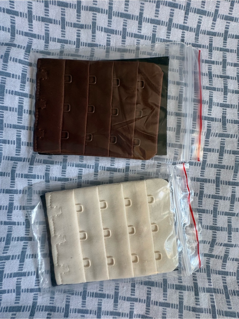 2 TRUEKIND Bra Extenders. 1 brown. 1 cream. Both have 4 hooks.